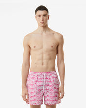 Load image into Gallery viewer, All-Over Waved Logo Print Swim Shorts | Men Swimwear Fuchsia | GCDS Spring/Summer 2023
